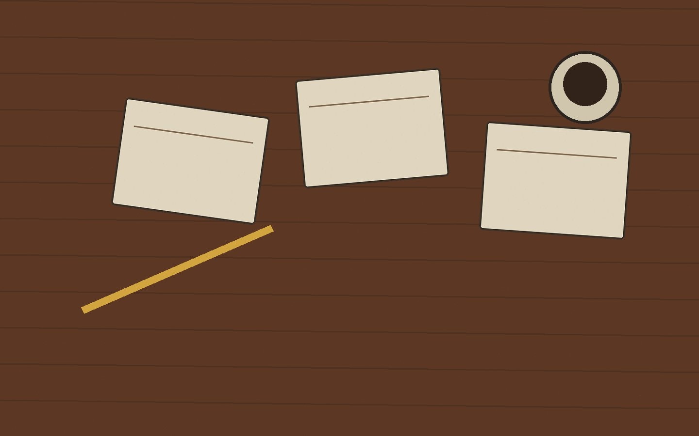 A rehearsal table with closed scripts, pencils and a paper cup